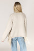 BUCK TASSEL SWEATER